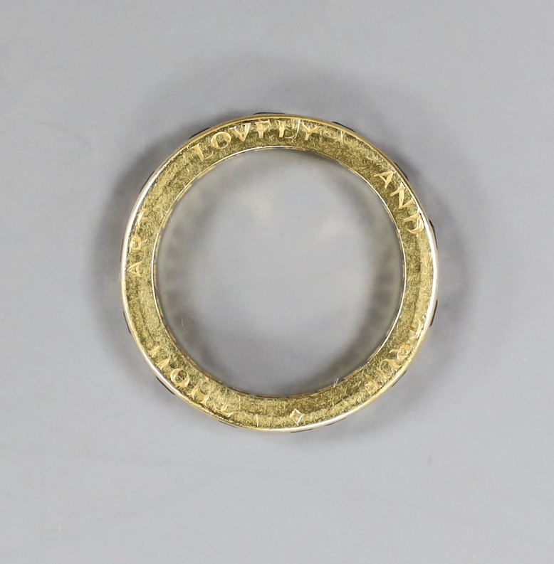 A yellow metal, sapphire and diamond set full eternity ring, the side of the shank engraved 'Thou Art Lovely And True', size N, gross weight 4.5 grams.